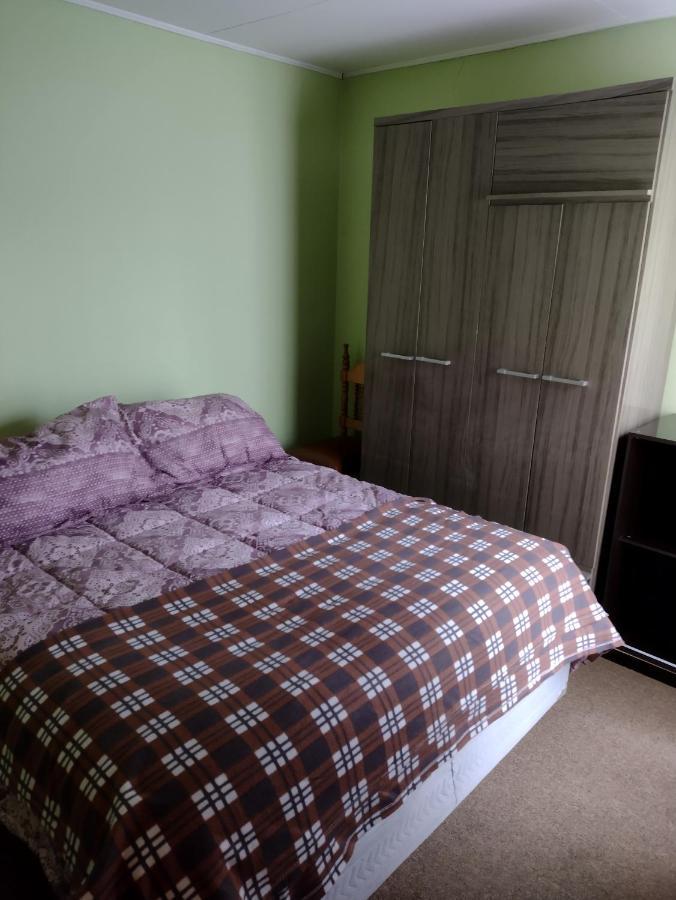 Hostal El Toque De Pilar プンタアレナス エクステリア 写真