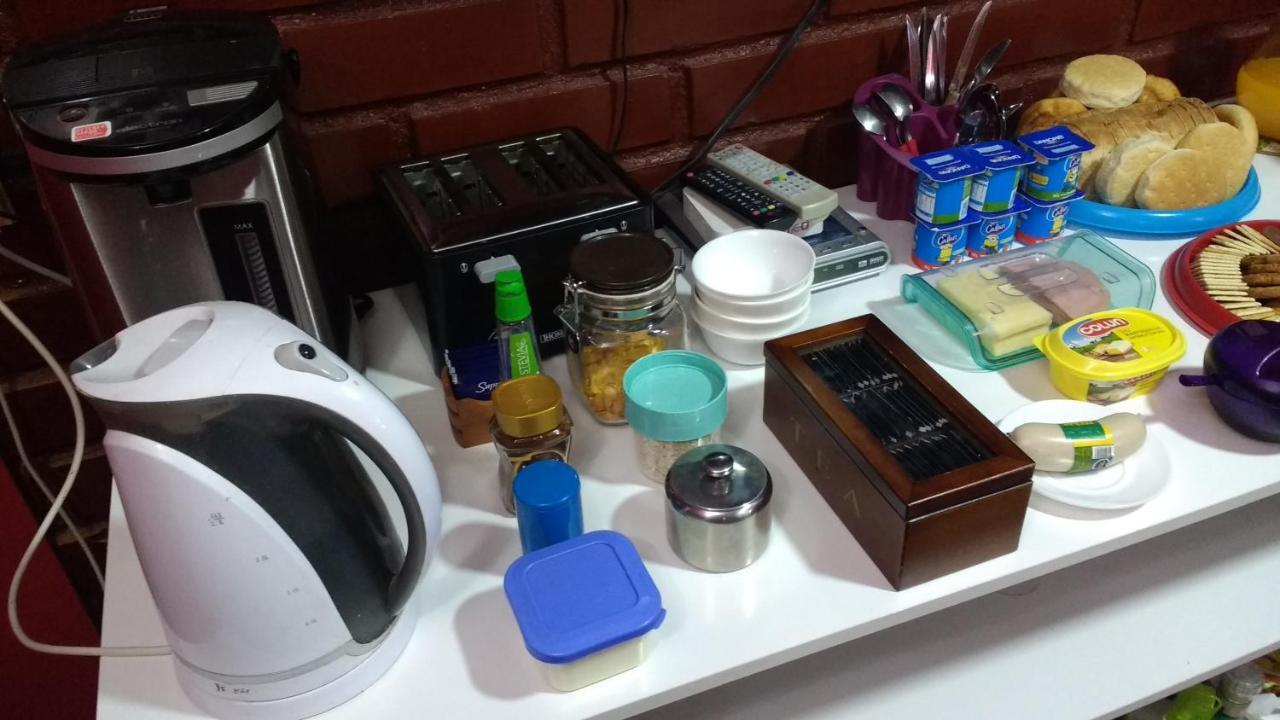 Hostal El Toque De Pilar プンタアレナス エクステリア 写真